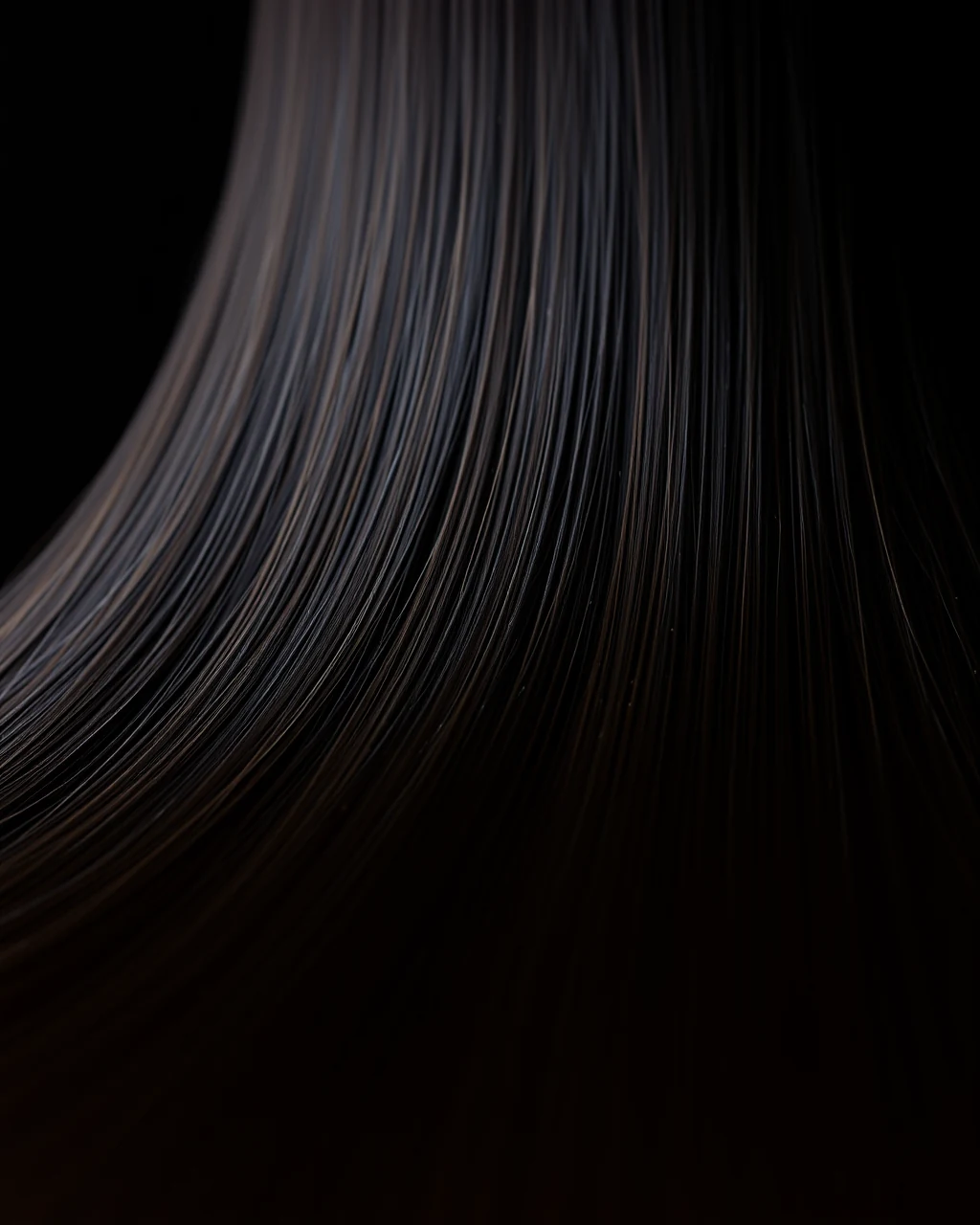 Concept photograph: a smooth sheet of freshly pressed hair catching a long specular highlight.